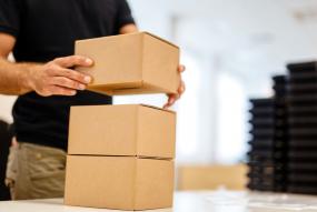 Man stacking boxes