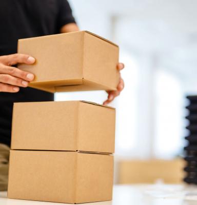 Man stacking boxes